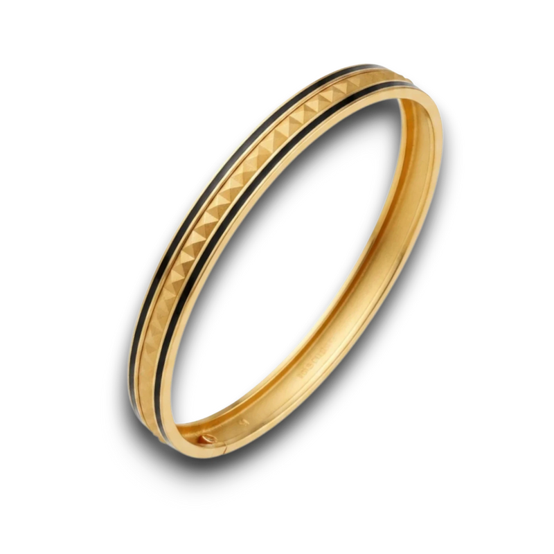 Amaranthus Gold Aslan cuff bracelet in 18k gold-plated titanium with textured geometric pattern and black enamel inlay.
